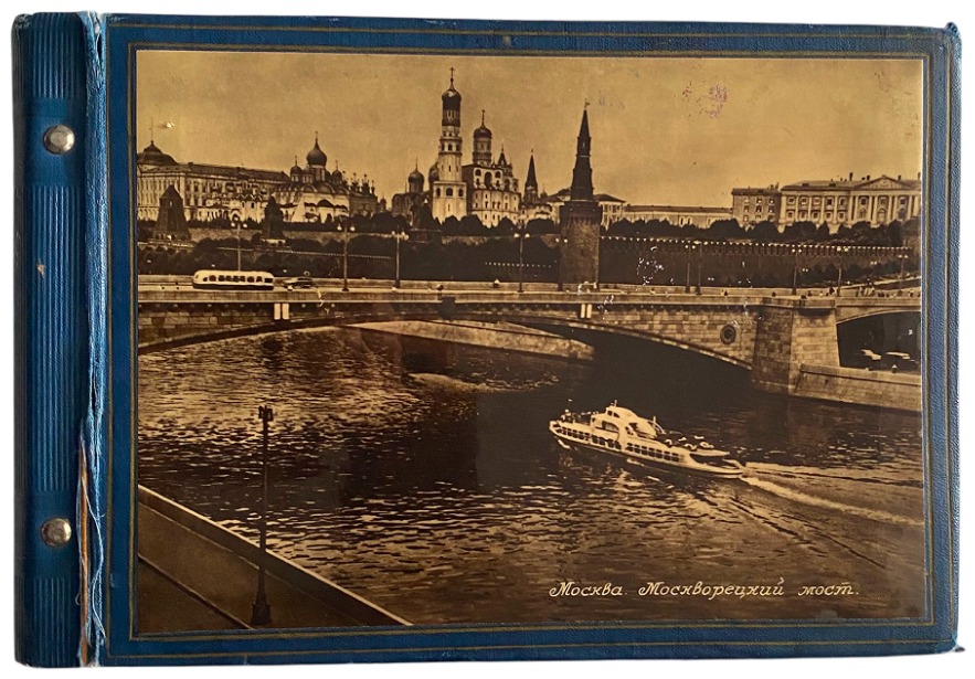 Cover of a blue family album depicting an archival photograph of Moscow